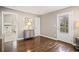 Bedroom showing ensuite bathroom with tile and frameless shower at 1684 Braeburn Se Dr, Atlanta, GA 30316