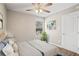 Bedroom with hardwood floors, neutral walls, and a bed with matching decor at 1684 Braeburn Se Dr, Atlanta, GA 30316