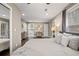 Bedroom showcases hardwood floors, ensuite bathroom and mirrored closet at 1684 Braeburn Se Dr, Atlanta, GA 30316