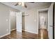 Bedroom with hardwood floors, a ceiling fan and ample closet space at 1684 Braeburn Se Dr, Atlanta, GA 30316