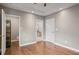 Bedroom with hardwood floors leading to a walk-in closet and bathroom at 1684 Braeburn Se Dr, Atlanta, GA 30316