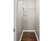 Walk-in closet with hardwood floors and shelving at 1684 Braeburn Se Dr, Atlanta, GA 30316