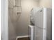 This laundry room features a stackable washer/dryer and a small freezer at 1684 Braeburn Se Dr, Atlanta, GA 30316