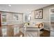 Spacious living room featuring hardwood floors, neutral colors, and paneled wall accents at 1684 Braeburn Se Dr, Atlanta, GA 30316