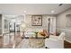 Open-concept living room featuring hardwood floors and neutral colors and recessed lighting at 1684 Braeburn Se Dr, Atlanta, GA 30316