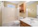 Functional bathroom featuring a combination shower and tub, along with built-in storage at 2901 Soapstone Ct, Powder Springs, GA 30127