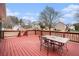 Expansive deck area perfect for outdoor relaxation, features an outdoor dining set at 2901 Soapstone Ct, Powder Springs, GA 30127