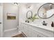 Elegant bathroom featuring double sinks, quartz countertops and a modern design at 1208 Thomas Rd, Decatur, GA 30030