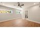 Bedroom with luxury vinyl plank flooring, natural light and attached bath at 1208 Thomas Rd, Decatur, GA 30030