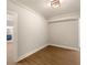 Bedroom boasting laminate floors, ceiling fan and ensuite bathroom at 1208 Thomas Rd, Decatur, GA 30030