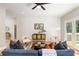 Comfortable living room features shiplap accent wall, stylish furnishings, and outdoor access at 1208 Thomas Rd, Decatur, GA 30030