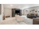 Large open living room with lots of light, decorative TV cabinet and plush comfortable furniture at 263 Osier Dr, Mcdonough, GA 30252