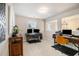 Bright home office space with two desks, a window, and neutral carpeting at 263 Osier Dr, Mcdonough, GA 30252