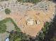 Aerial view of a house under construction on a large lot in a new community at 4525 Muskogee Ct, Cumming, GA 30040