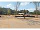 Future homesite with new construction in growing community with surrounding nature views at 4525 Muskogee Ct, Cumming, GA 30040