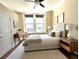 Comfortable bedroom with natural light, modern decor, and hardwood floors at 57 Forsyth Nw St # 4H, Atlanta, GA 30303