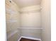 Walk-in closet with wire shelving and wooden floor, offering ample storage space at 57 Forsyth Nw St # 4H, Atlanta, GA 30303