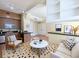 Open concept living room with modern decor, featuring a sleek kitchen and comfortable seating area at 57 Forsyth Nw St # 4H, Atlanta, GA 30303