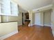 Spacious living room featuring hardwood floors and a built-in bookshelf at 57 Forsyth Nw St # 4H, Atlanta, GA 30303