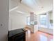 Living room with hardwood floors and a view of the kitchen and an abundance of natural light at 57 Forsyth Nw St # 4H, Atlanta, GA 30303