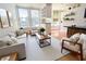 Bright living room featuring large windows, hardwood floors, and stylish contemporary furniture at 57 Forsyth Nw St # 4H, Atlanta, GA 30303