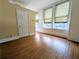 Bright and open living space with hardwood floors and multiple windows at 57 Forsyth Nw St # 4H, Atlanta, GA 30303