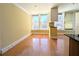 Well-lit living space with hardwood floors, bright windows, and a breakfast bar at 57 Forsyth Nw St # 4H, Atlanta, GA 30303