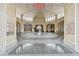 Spacious lobby with marble floors, directory signs and ornate architectural details at 57 Forsyth Nw St # 4H, Atlanta, GA 30303