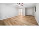 Spacious bedroom featuring wood floors, a ceiling fan, and a closet at 2833 Landing Way, Marietta, GA 30066