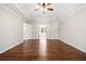 Large bedroom featuring laminate floors, crown molding, and ensuite bathroom at 2833 Landing Way, Marietta, GA 30066