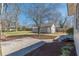 Backyard with shed, patio, and landscaped areas at 1763 Mercer Ave, Atlanta, GA 30337