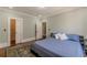 Bright bedroom features hardwood floors, and ample closet space at 1763 Mercer Ave, Atlanta, GA 30337