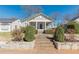 Beautiful single-story house offering a classic front porch and landscaped front yard at 1763 Mercer Ave, Atlanta, GA 30337