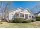Attractive single-story home with a covered front porch and well-maintained lawn at 1763 Mercer Ave, Atlanta, GA 30337