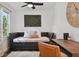 Bedroom featuring a daybed, desk and an oversized wall clock at 3314 Creatwood Se Trl, Smyrna, GA 30080