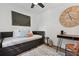 Bedroom featuring a daybed, desk and an oversized wall clock at 3314 Creatwood Se Trl, Smyrna, GA 30080