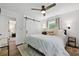 Bright main bedroom with sliding barn door access to the closet at 3314 Creatwood Se Trl, Smyrna, GA 30080