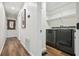 Hallway laundry room featuring a modern washer and dryer set at 3314 Creatwood Se Trl, Smyrna, GA 30080