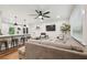 Open concept living room and kitchen featuring modern finishes and ample seating at 3314 Creatwood Se Trl, Smyrna, GA 30080