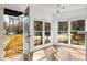 Sunlit entryway featuring gleaming hardwood floors and a welcoming ambiance at 816 Frederica Ne St, Atlanta, GA 30306