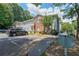 Well-maintained apartment complex, with manicured landscaping and ample parking at 1352 Orchard Park Dr, Stone Mountain, GA 30083