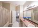 The bathroom has a shower/tub combo and a large vanity with lots of counter space at 1352 Orchard Park Dr, Stone Mountain, GA 30083