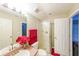 Bathroom with a sink, shower, toilet, and a towel hanging on the towel rack at 1352 Orchard Park Dr, Stone Mountain, GA 30083