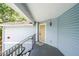 Inviting entryway with a railing leading up to the front door of the condo unit at 1352 Orchard Park Dr, Stone Mountain, GA 30083