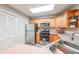 Kitchen features stainless steel appliances and light wood cabinetry at 1352 Orchard Park Dr, Stone Mountain, GA 30083