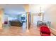 Open-concept living area features dining space and comfortable seating at 1352 Orchard Park Dr, Stone Mountain, GA 30083