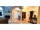 Open-concept living area features a fireplace, dining area, and plenty of natural light at 1352 Orchard Park Dr, Stone Mountain, GA 30083