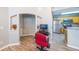 This office area has great natural light and connects the dining area to kitchen at 1352 Orchard Park Dr, Stone Mountain, GA 30083