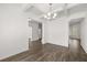Spacious living room with beautiful wood floors, white walls, and coffered ceiling at 1861 Lacebark Elm Way, Lawrenceville, GA 30045
