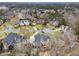 Neighborhood view with landscaped lawns and curved drives in an upscale community at 551 Straton Chase Se, Marietta, GA 30067